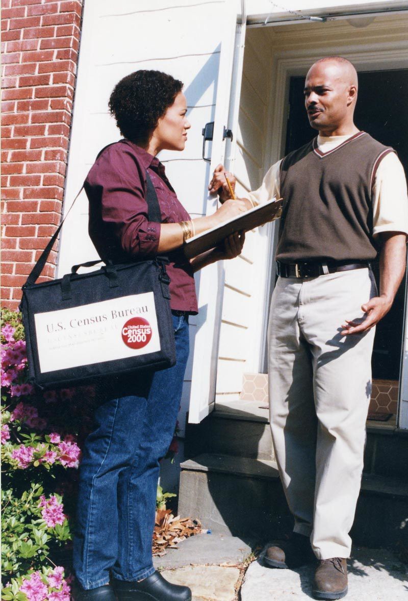 Census Taker visits resident during 2000 Census.jpg